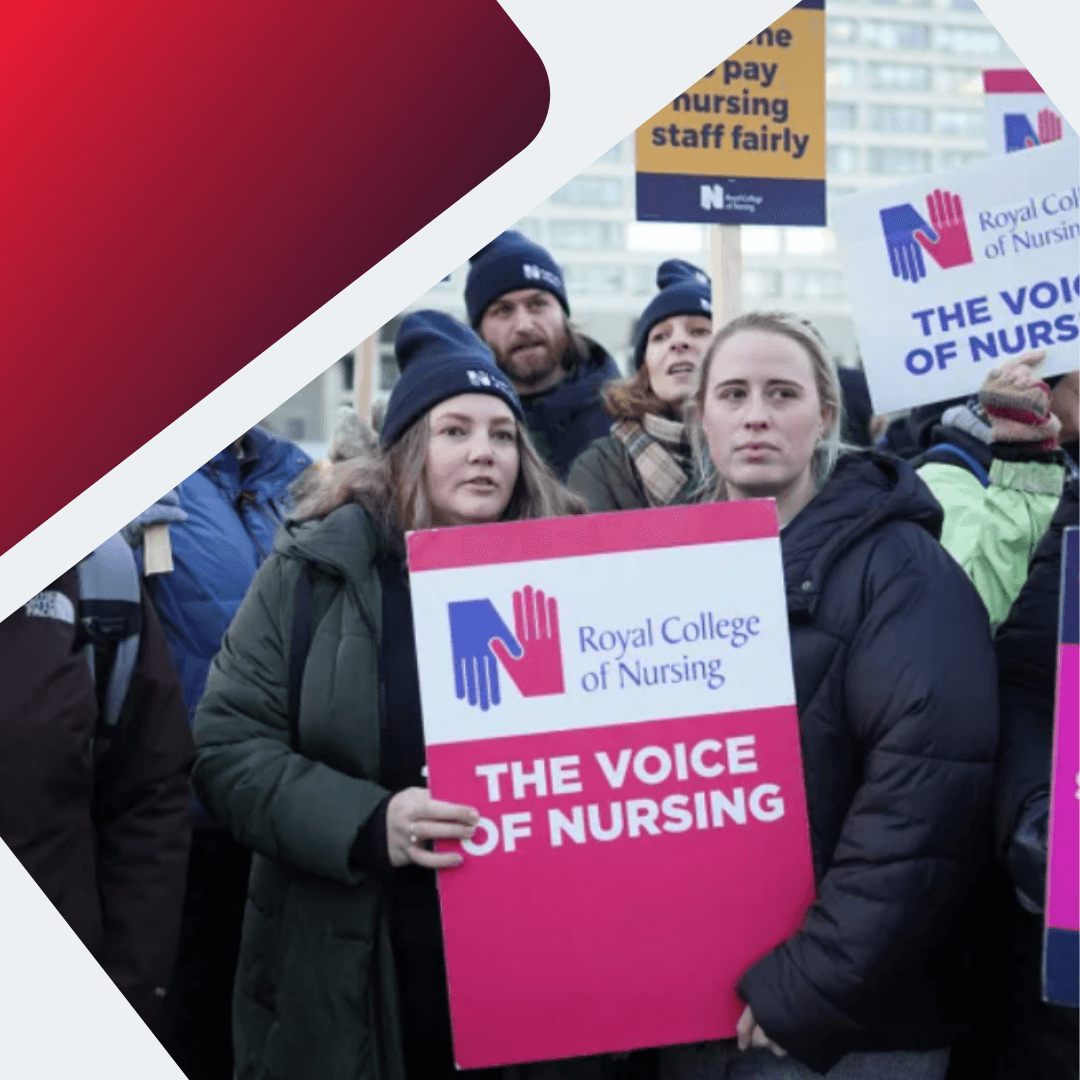 a group of nurses of royal college of nursing protesting outside