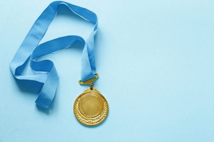 Gold Medal with Ribbon.