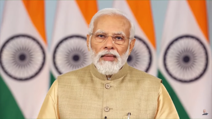 Narendra modi picture with India flag behind